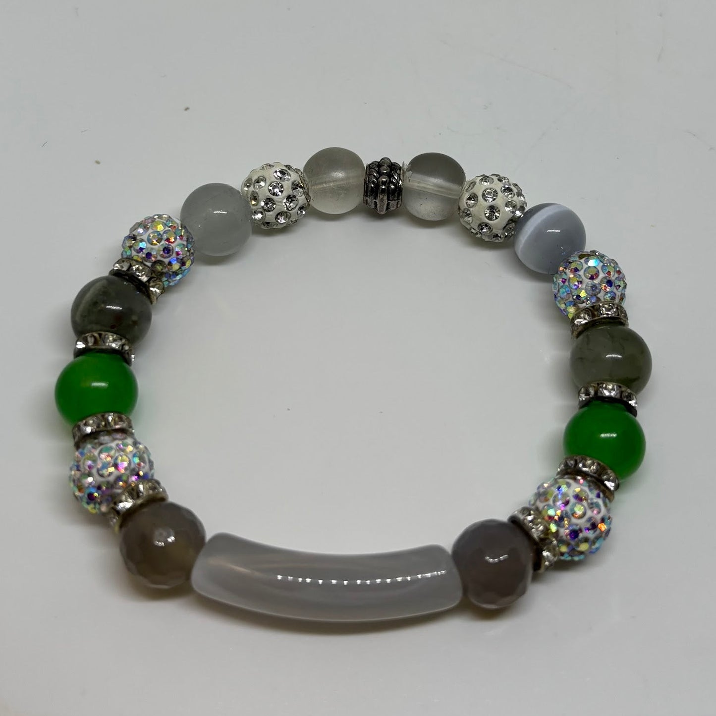 Multicolored beaded bracelet on a white background