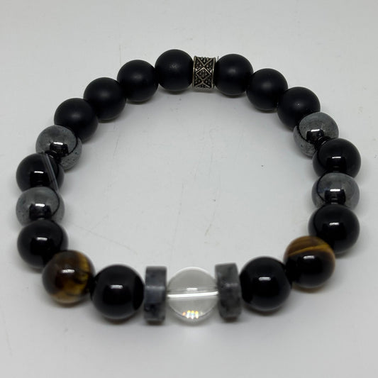 Beaded bracelet with black, gray, and brown beads on a white background