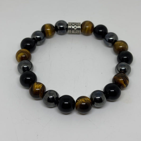 Beaded bracelet with black, brown, and gray beads on a white background